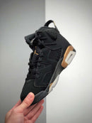 Nike Air Jordan 6 Preto e Dourado