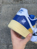 Tênis Nike x Undefeated Air Force 1 Low SP “5 On it”