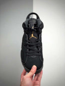 Nike Air Jordan 6 Preto e Dourado